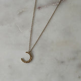 Golden Crescent Glow Necklace